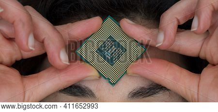Computer Cpu Chip Over The Forehead, Front View