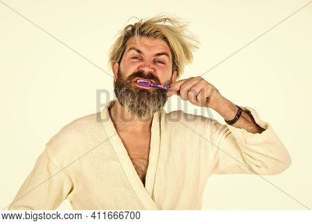 Carefree Guy Hold Tooth Brush. Health And Hygiene. Handsome Man Brush Teeth In Morning. Relaxed Man 