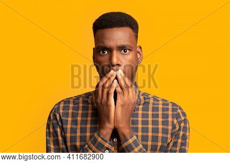 No Way. Shocked African American Guy Covering Mouth With Hands And Looking At Camera With Concerned,