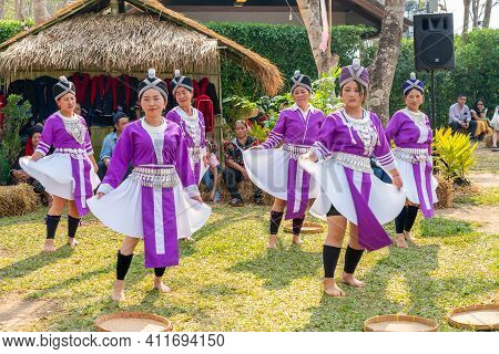 Chiangrai, Thailand - February 16, 2019: Beautiful Hill Tribe Girls In Violet Traditional Costume Da