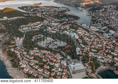 Aerial Drone Shot Of Lapad Dubrovnik Bridge With Sunrise Over Peak In Croatia Summer Morning