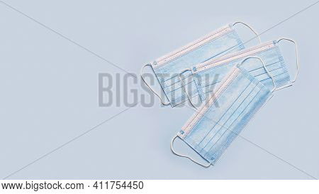 Protective Face Mask On A Blue Background