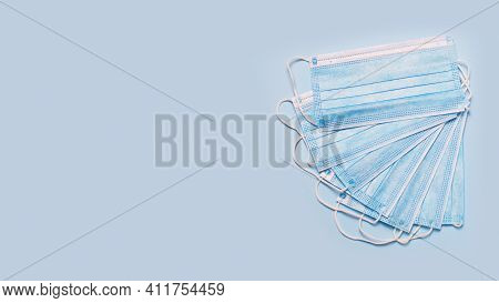 Protective Face Mask On A Blue Background
