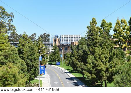 IRVINE, CALIFORNIA - 16 APRIL 2020: Peltason Drive through the campus at the University of California Irvine, UCI.