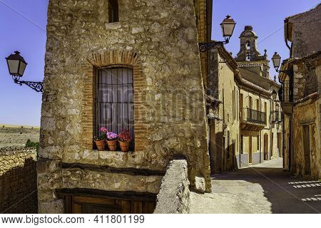 Medieval Village With Stone Houses, Cobblestone Streets, Old Doors And Windows, Arches And Walls. Ma