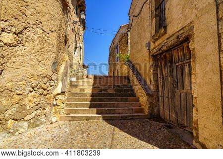 Medieval Village With Stone Houses, Cobblestone Streets, Old Doors And Windows, Arches And Walls. Ma