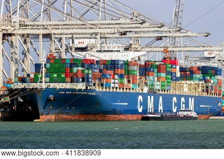 Rotterdam - Mar 16, 2016: Cma Cgm Container Ship Being Loaded By Gantry Cranes In The Ect Shipping T