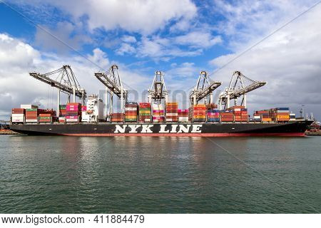 Rotterdam, The Netherlands - Sep 8, 2019: Nyk Line Container Ship Is Being Loaded By Cranes In The P