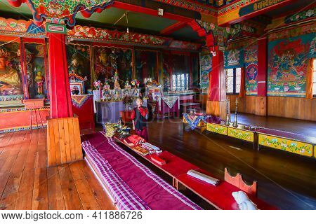 Rinchenpong, Sikkim, India - 17th October 2016 : One Young Boy Lama Standing Inside Prayer Room At R