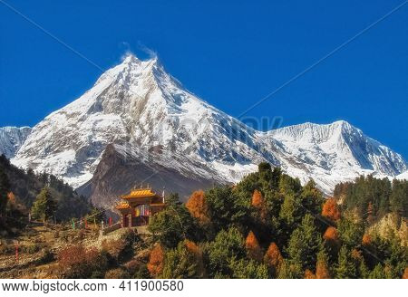 Beautiful Peak Manaslu In The Autumn Himalaya Mountains In Nepal With A Buddhist Monastery At The Fo