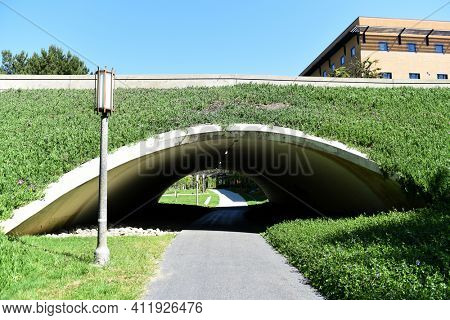 IRVINE, CALIFORNIA - 22 APRIL 2020: Tunnel from the Jao Family Sculpture Garden to the Student Center on the Campus of the University of California Irvine, UCI.