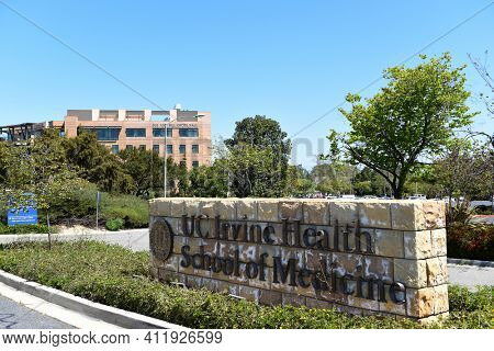 IRVINE, CALIFORNIA - 22 APRIL 2020:  UC Irvine Health School of Medicine sign on the Campus of the University of California Irvine, UCI.