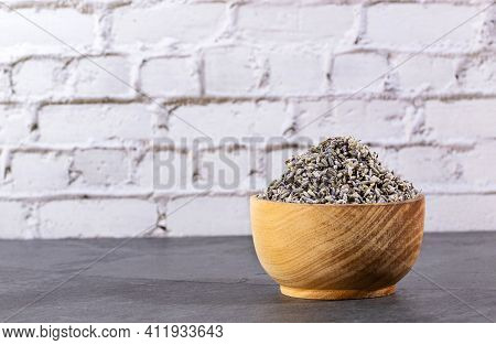 Dried Lavender Flowers In The Wooden Bowl - Lavandula.