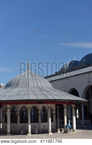 Turkey, Istanbul 14,03,2018 Mihrimah Sultan Mosque In Uskudar District. Muslims And Tourists Walk Th