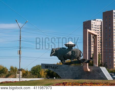 Engels, Russia, September 27, 2020 - The Symbol Of The City Of Engels - A Statue Of A Bull With A Cu