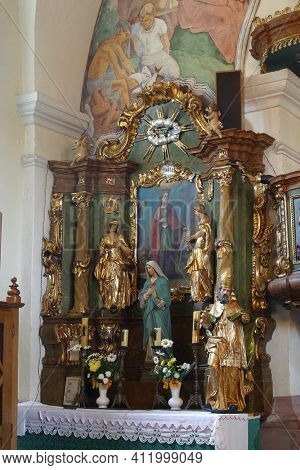 SVETI PETAR MREZNICKI, CROATIA - JULY 14, 2013: Altar of St. Barbara at St. Peter's Parish Church in Sveti Petar Mreznicki, Croatia