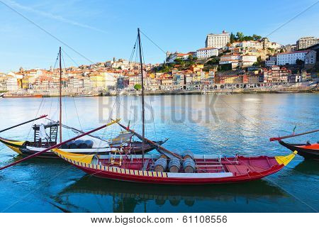 old Porto and traditional boats with wine barrels Portugal