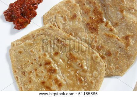 A Paratha (or Parantha) Is A Flatbread That Originated In India/ South Asia