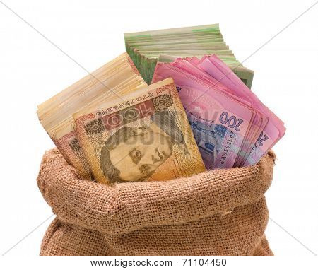 Full money bag with ukrainian hryvna, isolated on white background 