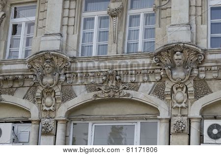 Fragment close up of ancient building with rich decoration in centre of Ruse town, Bulgaria    from