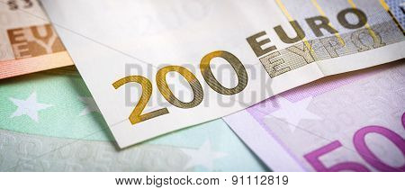 Closeup Of Euro Banknotes And Coins