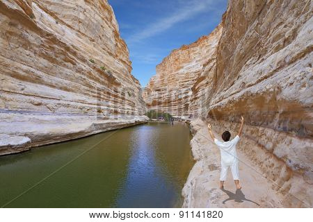  Woman in white performs asana 