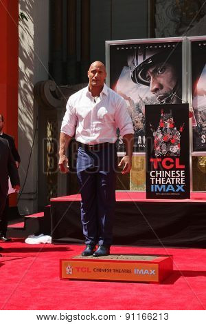 LOS ANGELES - MAY 19:  Dwayne Johnson, The Rock at the Dwayne Johnson Hand and Foot Print Ceremony at the TCL Chinese Theater on May 19, 2015 in Los Angeles, CA