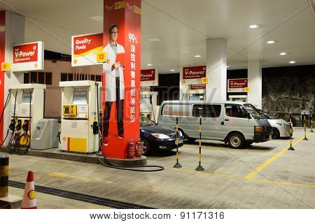 HONG KONG - APRIL 15, 2015: Shell fuel station at evening. Shell Oil Company is the United States-based subsidiary of Royal Dutch Shell