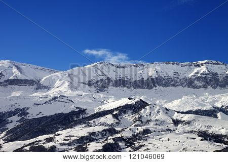 Snowy Mountains And Blue Sky At Nice Sun Day