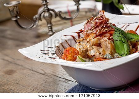 Tasty Grilled Chicken Salad With Rucola, Cherry Tomatoes, Valerian, Basil, Seeds, Bread Crumbs On An