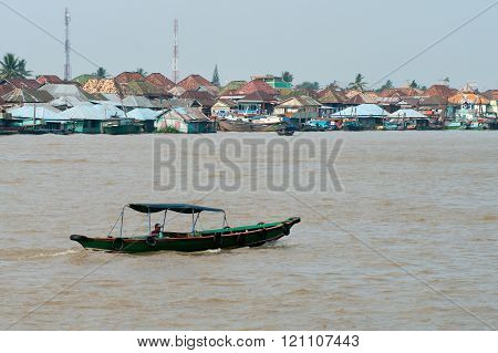 Boat on Musi River July 30, 2011 in Palembang, Sumatra, Indonesia.