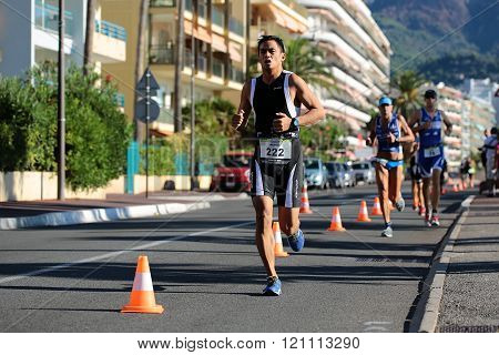 Runners From Different Teams Compete