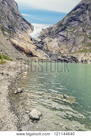 Briksdalsbreen - Briksdal glacier, Briksdalsbreen glacier, Stryn in Sogn, Norway. 
Briksdalsbreen - Briksdal glacier,  is one of the most accessible and best known arms of the Jostedalsbreen glacier.