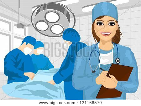 female surgical nurse in operating room holding clipboard