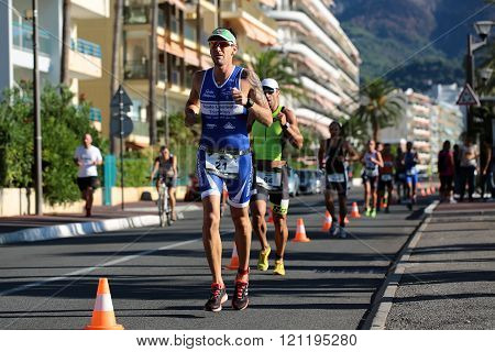 Runners From Different Teams Compete