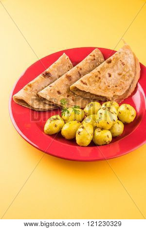dray potato curry or potato bhaji or aalu bhaji and roti or chapati