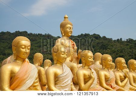 Golden big buddha statue in thai temple