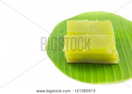 Kind of Thai sweetmeat, Multi Layer Sweet Cake (Kanom Chan) on banana leaf in white background