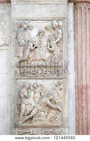BOLOGNA, ITALY - JUNE 04: Jacob and the Angel by Niccolo Tribolo up and Benjamin brings the cup to Pharaoh by Francesco da Milano, left door of San Petronio Basilica in Bologna, Italy, on June 04,2015
