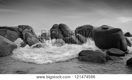 Powerful Waves crushing on a rocky beach