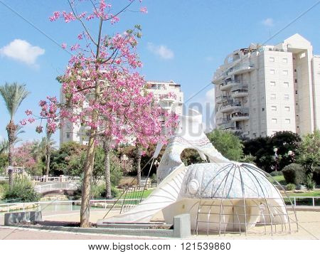 Playground near modern white buildings in quarter Neve Savyon in Or Yehuda Israel