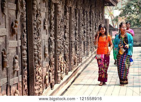 Mandalay Myanmar - March 15 2015: Girls in Golden Shwenandaw Kyaung temple in Mandalay.