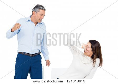 Angry man about to hit his wife on whitebackground