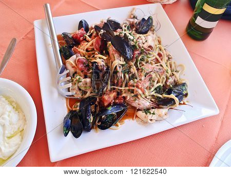 plate with seafood at a traditional greek tavern