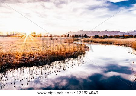 mountain sunrise in Bavaria at Uffing marshland