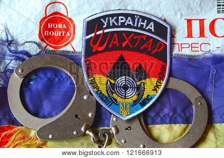 Chevron Ukrainian nazionalist battalion  Miner in Police.The battalion disbanded for looting and torture February 20,2016 in Kiev, Ukraine