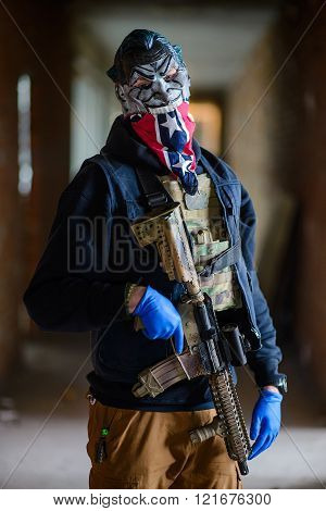 Photo Of Man Wearing Mask With Gun