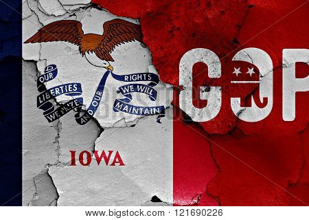 flag of Iowa and gop painted on cracked wall