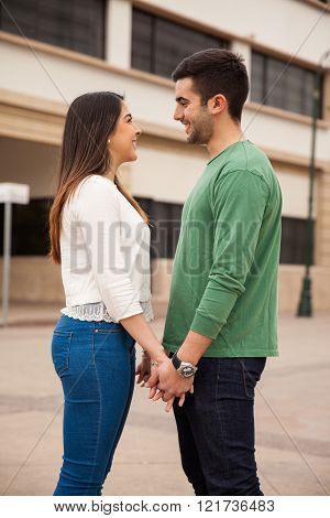 Holding Hands And Looking At Each Other