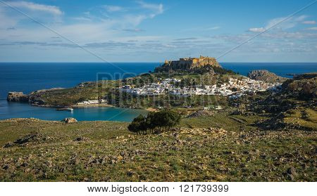 Beautiful Landscape With Lindos Town On The Slope Of A Hill